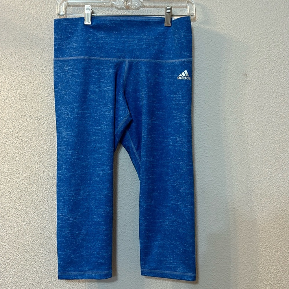 NWT Adidas mid-rise leggings with 50spf size medium